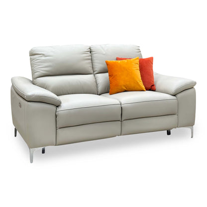 Pavilion soft grey leather 2 seater power recliner sofa, angled view upright with orange and red cushions
