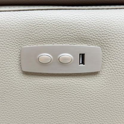 Close-up of the power recline control panel with two buttons and a USB port on the Pavilion sofa arm