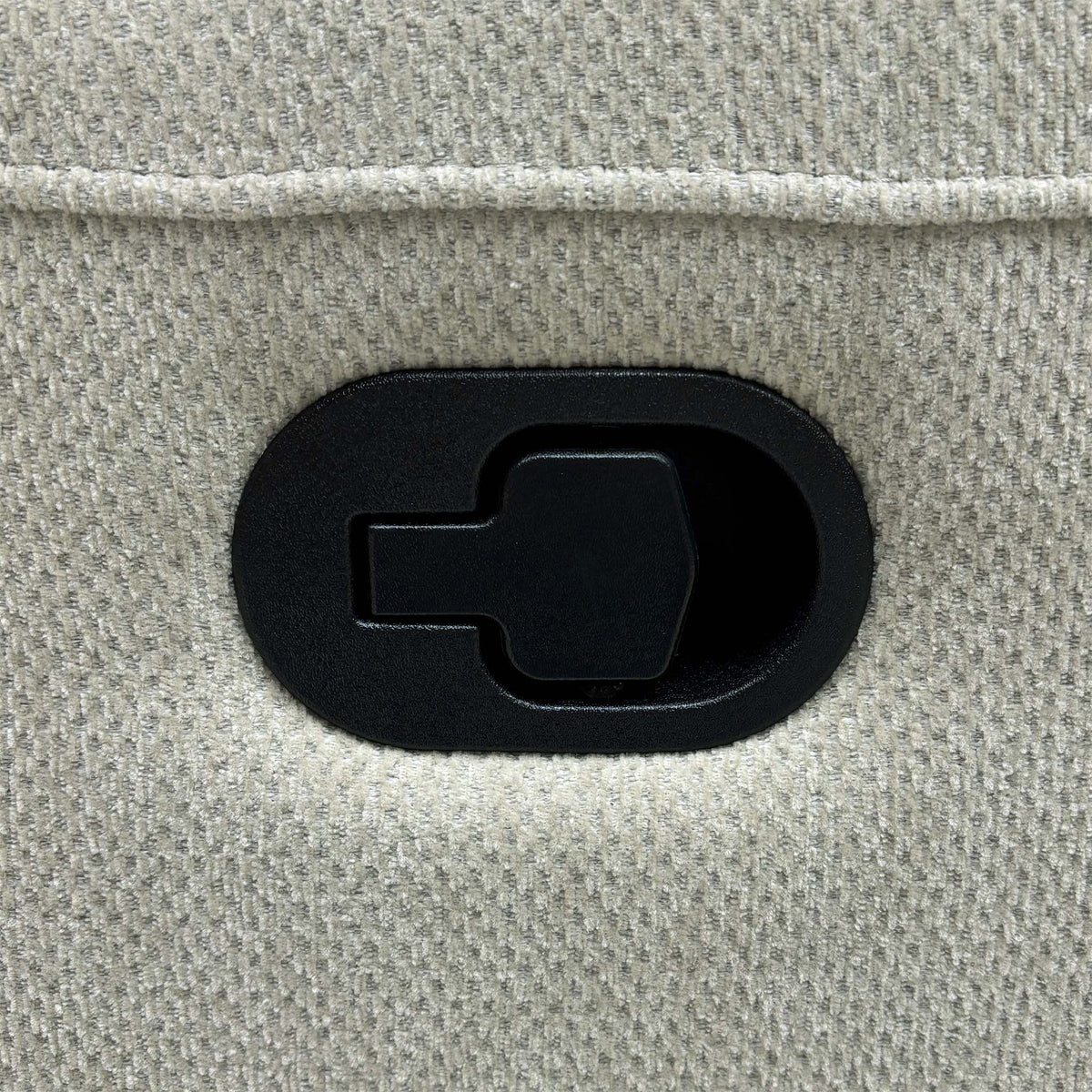 Close-up of the black pull handle on the Miro natural fabric manual recliner sofa