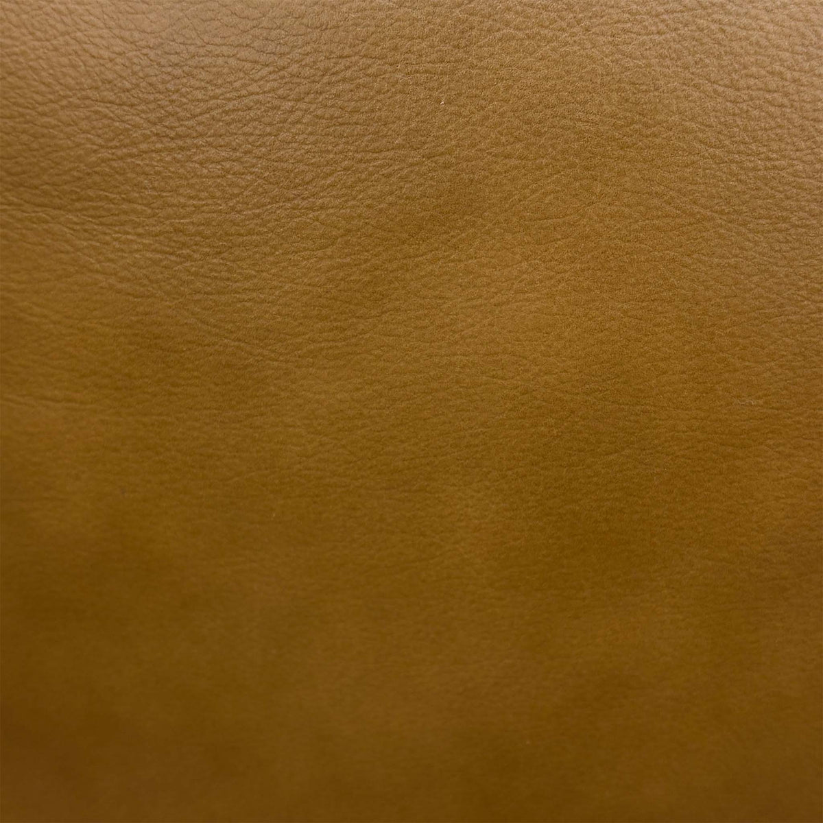 Close-up of the tan brown grained leather used on the Marlow corner chaise sofa