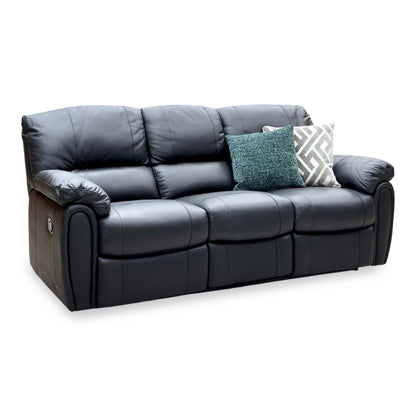 Angled view of the Leighton black faux leather 3 seater recliner sofa upright with teal and patterned cushions