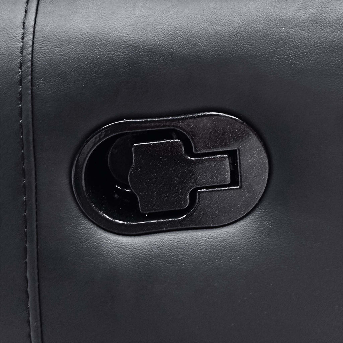Close-up of the manual recline handle on the arm of the Leighton black faux leather sofa