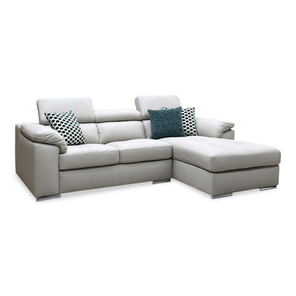 Brady grey leather 3 seater chaise sofa angled from the left showing the chrome feet and adjustable headrests