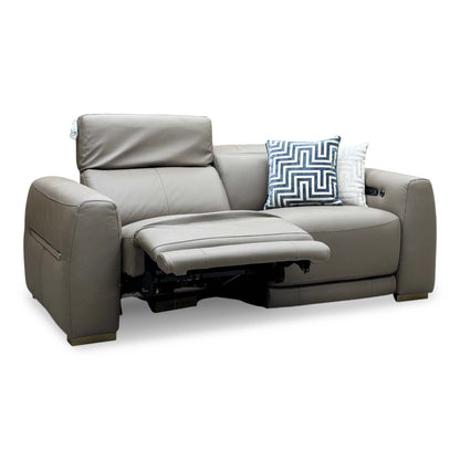 Edison taupe leather 3 seater power recliner sofa with the left seat reclined, angled view