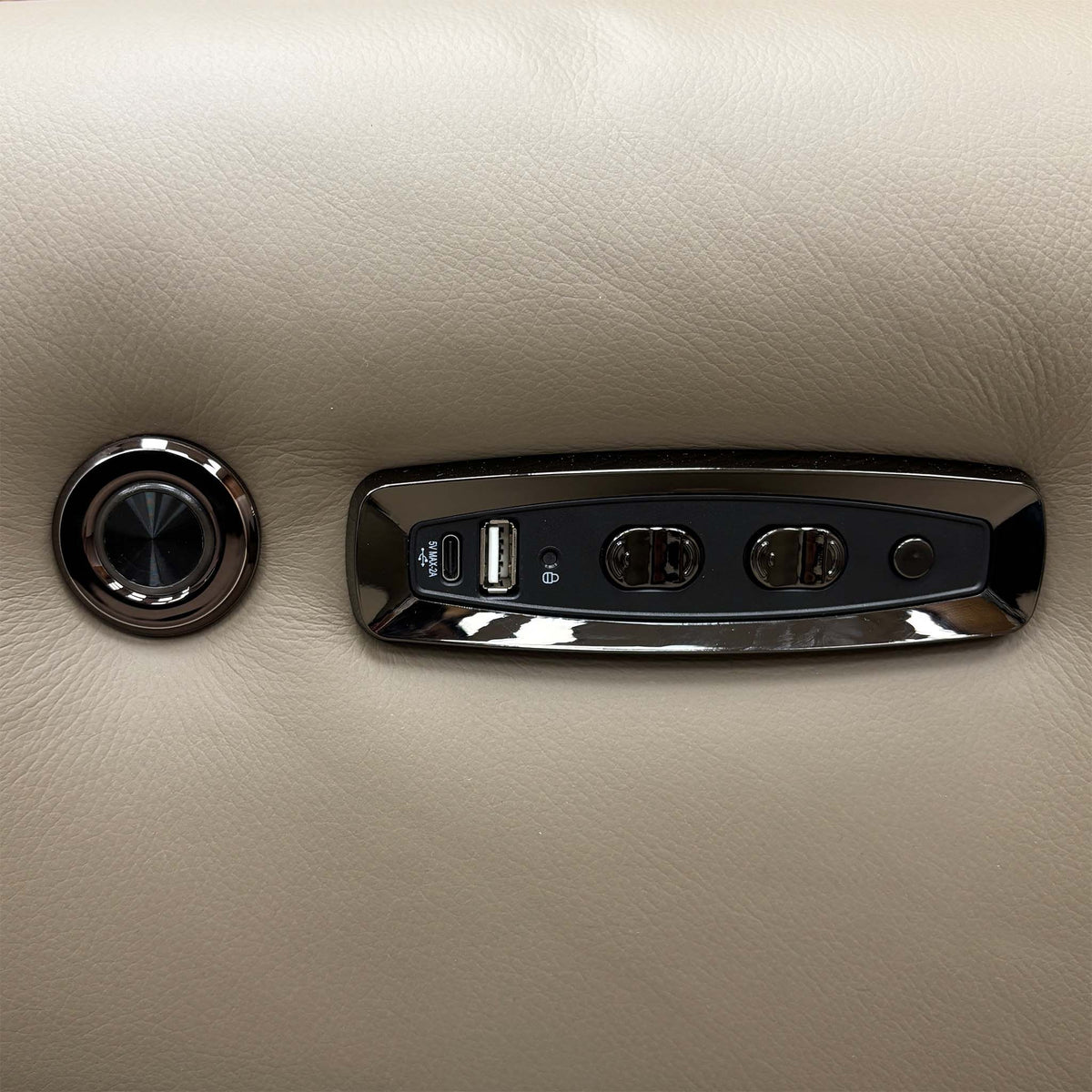 Close-up of the Edison sofa power recliner controls with USB port and round light button