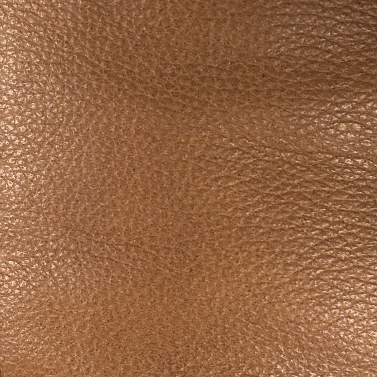 Close-up of the bark brown grained leather used on the Marinelli Viali sofa set