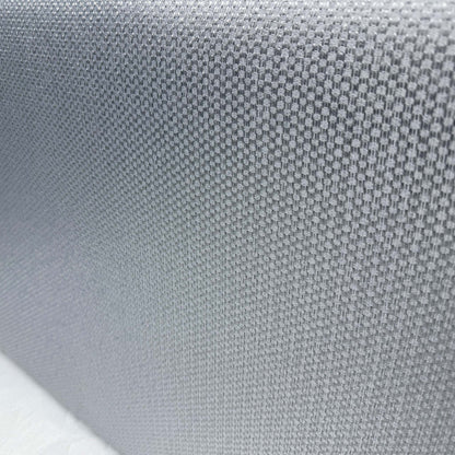 Close-up of the grey woven fabric used on the Gus guest bed divan base