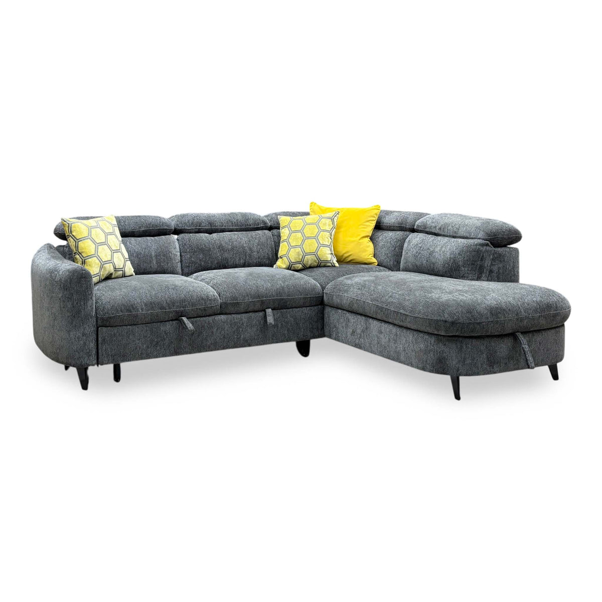 Snooze charcoal grey chenille corner sofa bed seen from the left, chaise end to the right with black tapered legs