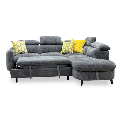 Front view of the Snooze charcoal grey chenille corner sofa bed with the pull-out bed extended