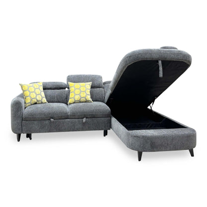 Front view of the Snooze charcoal grey chenille corner sofa bed with the chaise end storage open