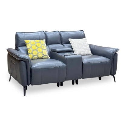 Jude lavender grey leather 2 seater power recliner, angled view with yellow and cream scatter cushions