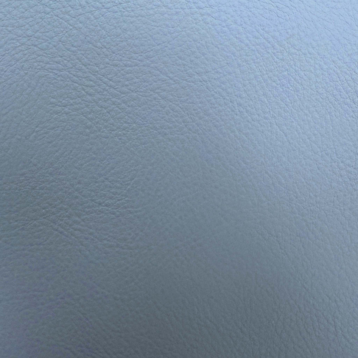 Close-up of the light grey grained faux leather used on the Fumo dining bench