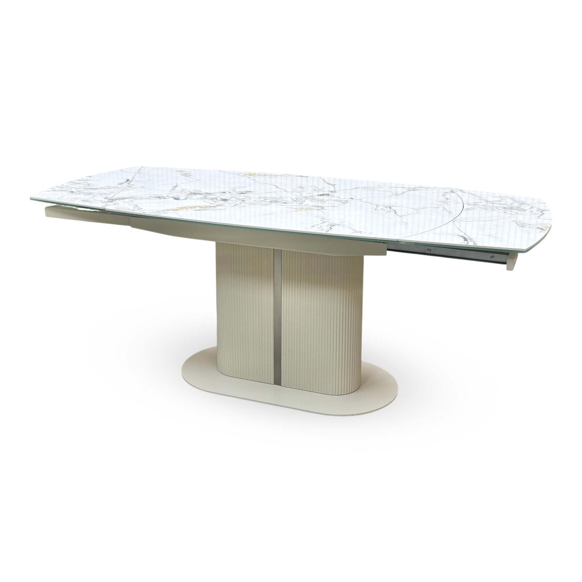 Avorio ceramic top swivel extending dining table fully extended, angled view from the right showing the oval base