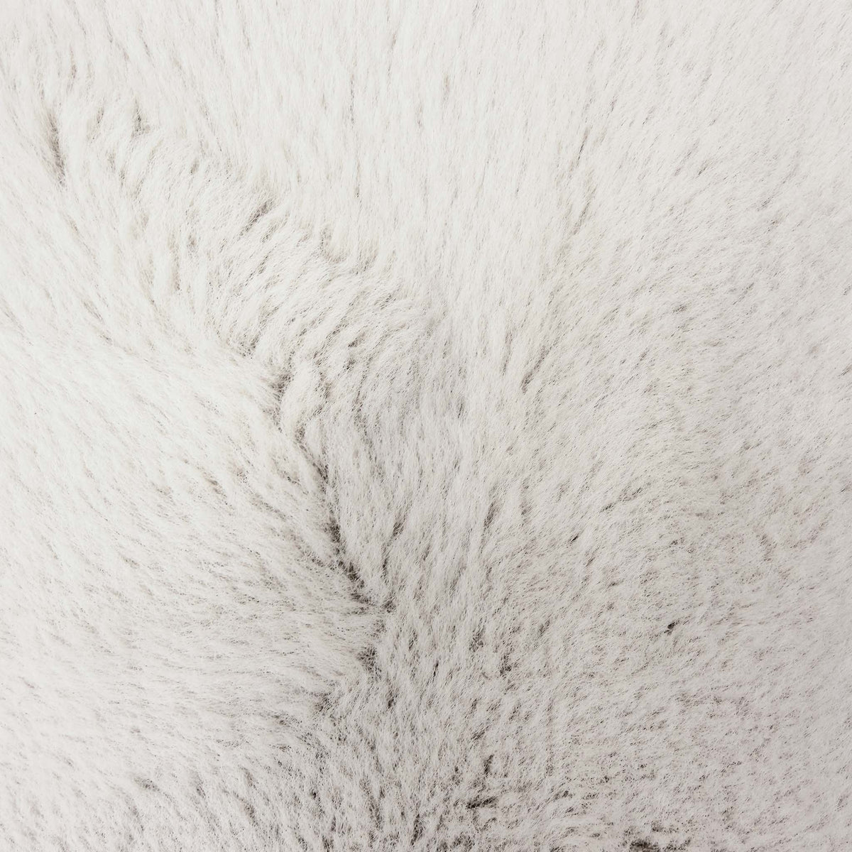 Close-up of the ivory faux fur with dark tipped pile used on the Blenheim Darwin footstool