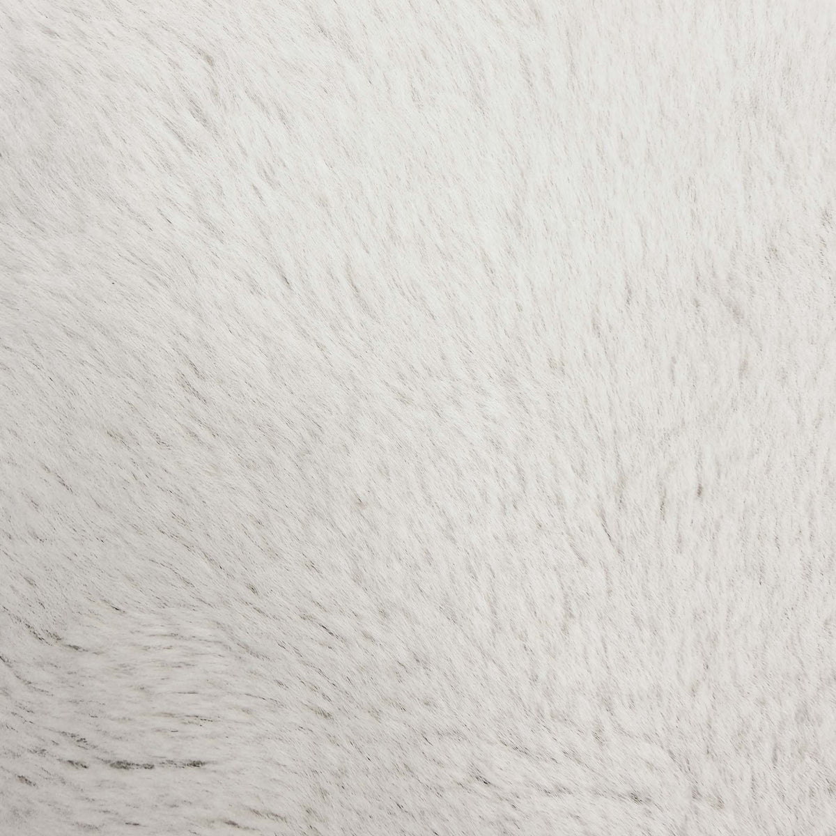 Close-up of the soft ivory faux fur pile used on the Blenheim Darwin large footstool