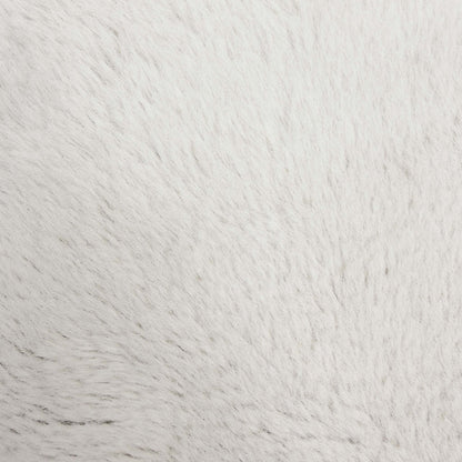 Close-up of the soft ivory faux fur pile used on the Blenheim Darwin large footstool