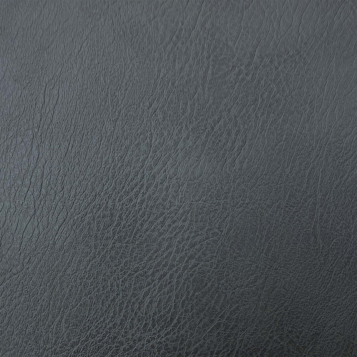 Close-up of the grey faux leather used on the Jupiter swivel dining chairs