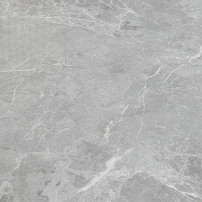 Close-up of the grey marble-effect finish used on the Fumo high gloss dining table top