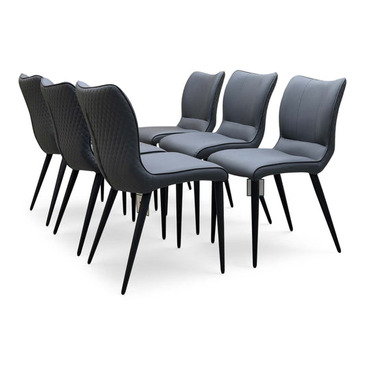 Clio grey faux leather dining chairs, set of six with quilted backs and black tapered legs, angled view