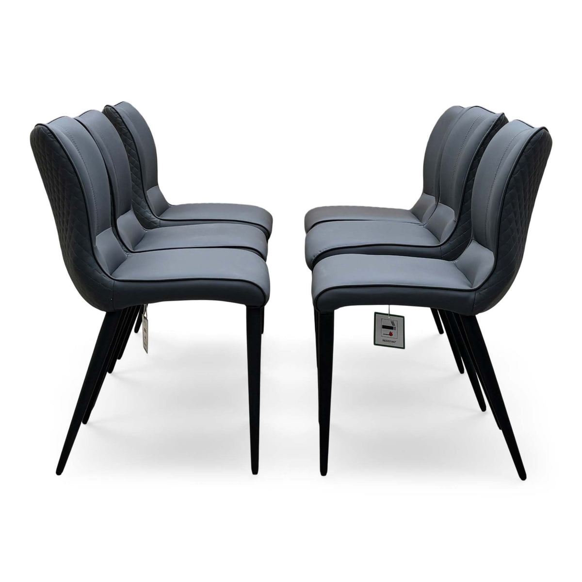Side view of the six Clio grey faux leather dining chairs in two rows of three