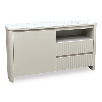 Avorio ceramic top small sideboard with one door, open shelf and two ribbed drawers, angled from the left