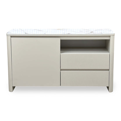 Front view of the Avorio ceramic top small sideboard with curved ends and ribbed drawer fronts