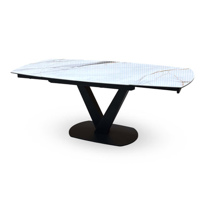 Julio marble ceramic extending dining table fully extended, seen from the other end