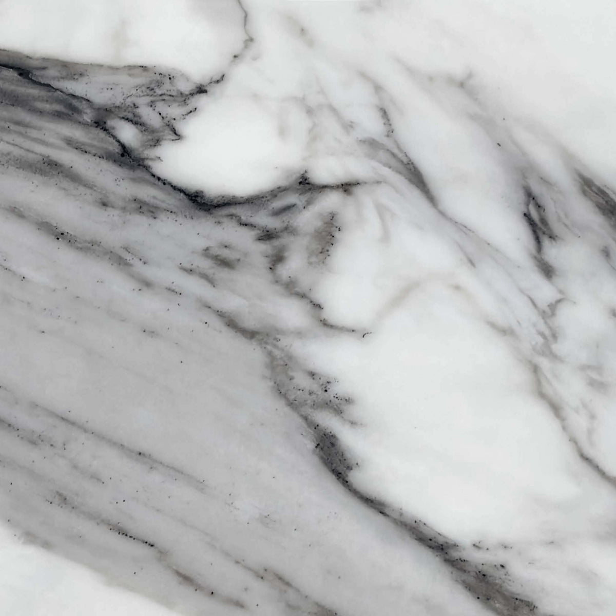 Close-up of the grey-veined white marble effect ceramic used on the Julio dining table top