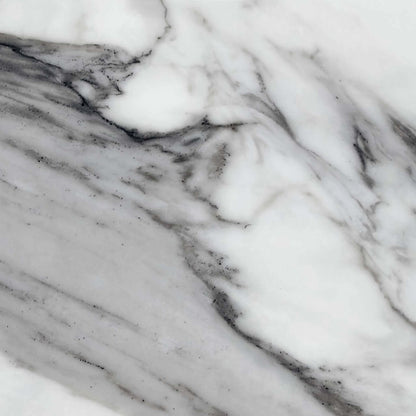 Close-up of the grey-veined white marble effect ceramic used on the Julio dining table top