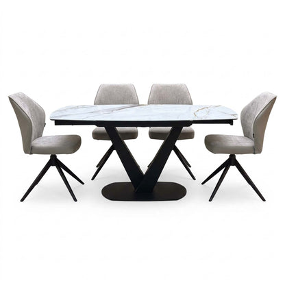 Julio dining set with the gold-veined marble ceramic top and four cream swivel chairs, seen from the front