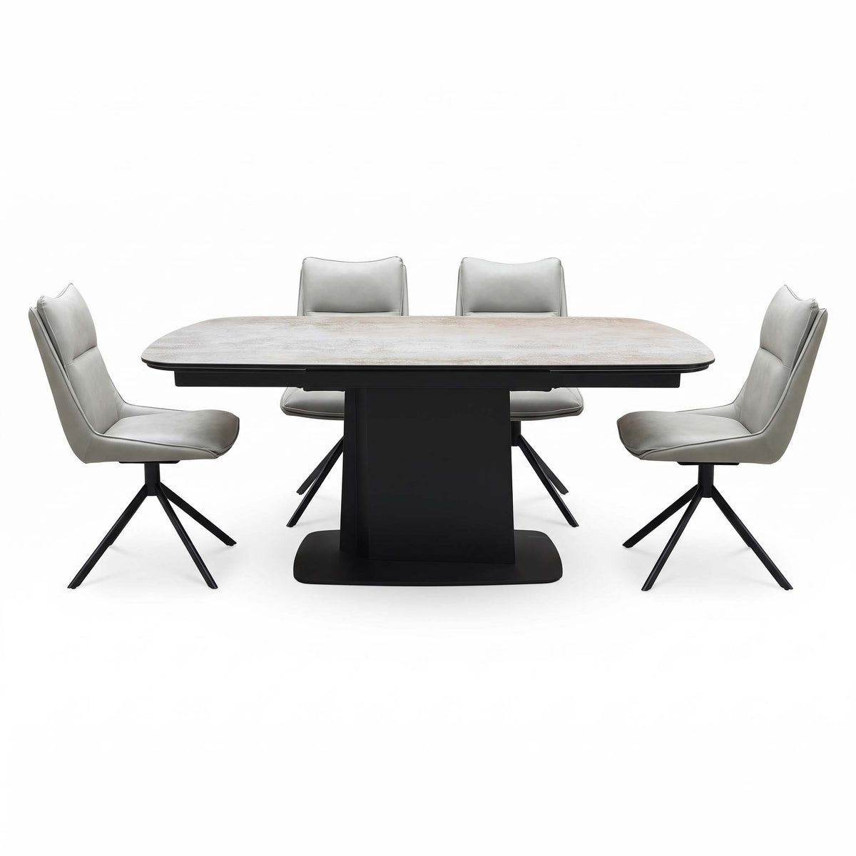 Catalina ceramic top dining table seen head-on with four taupe swivel dining chairs, two each side