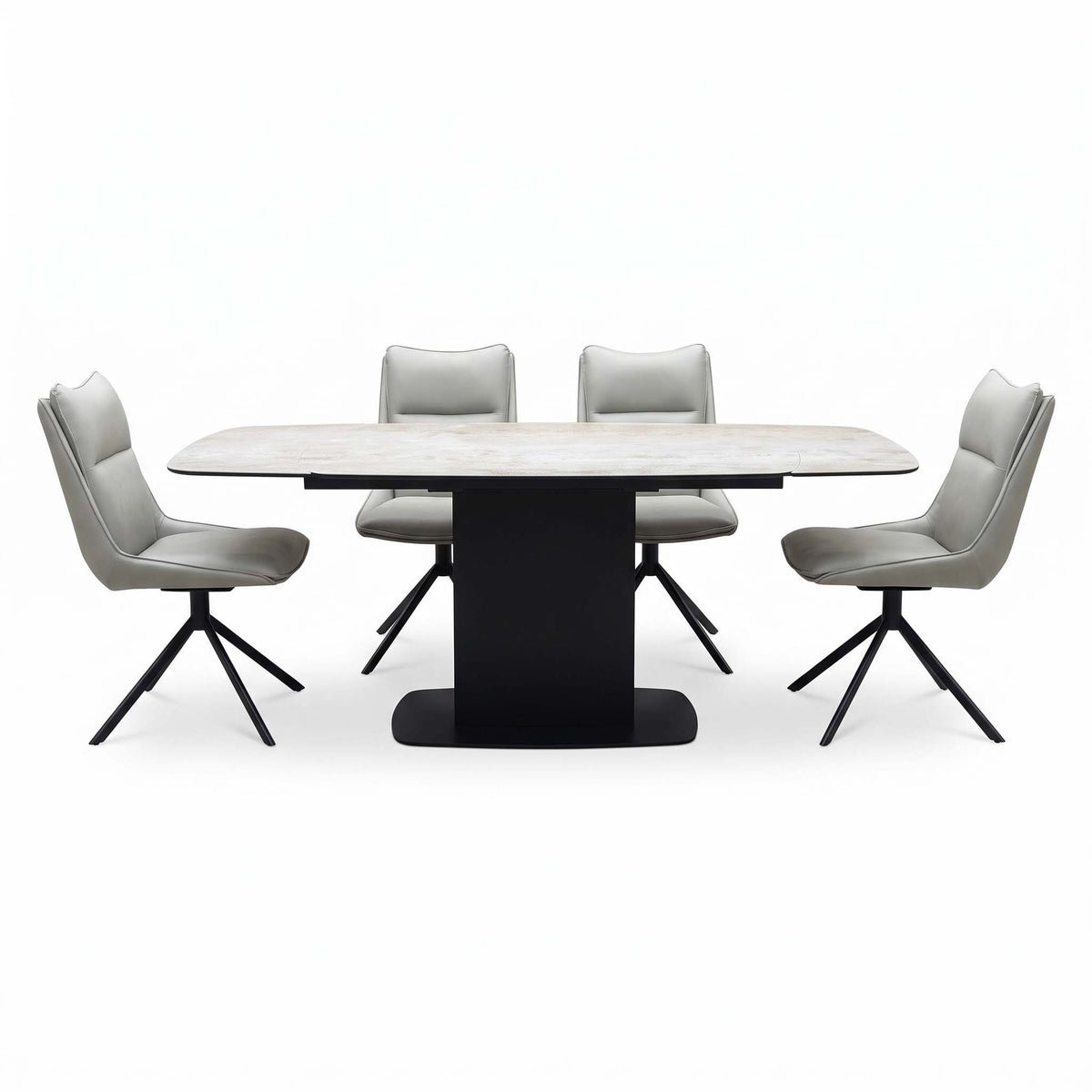 Front view of the Catalina ceramic dining table on its black pedestal base with four taupe faux leather swivel chairs