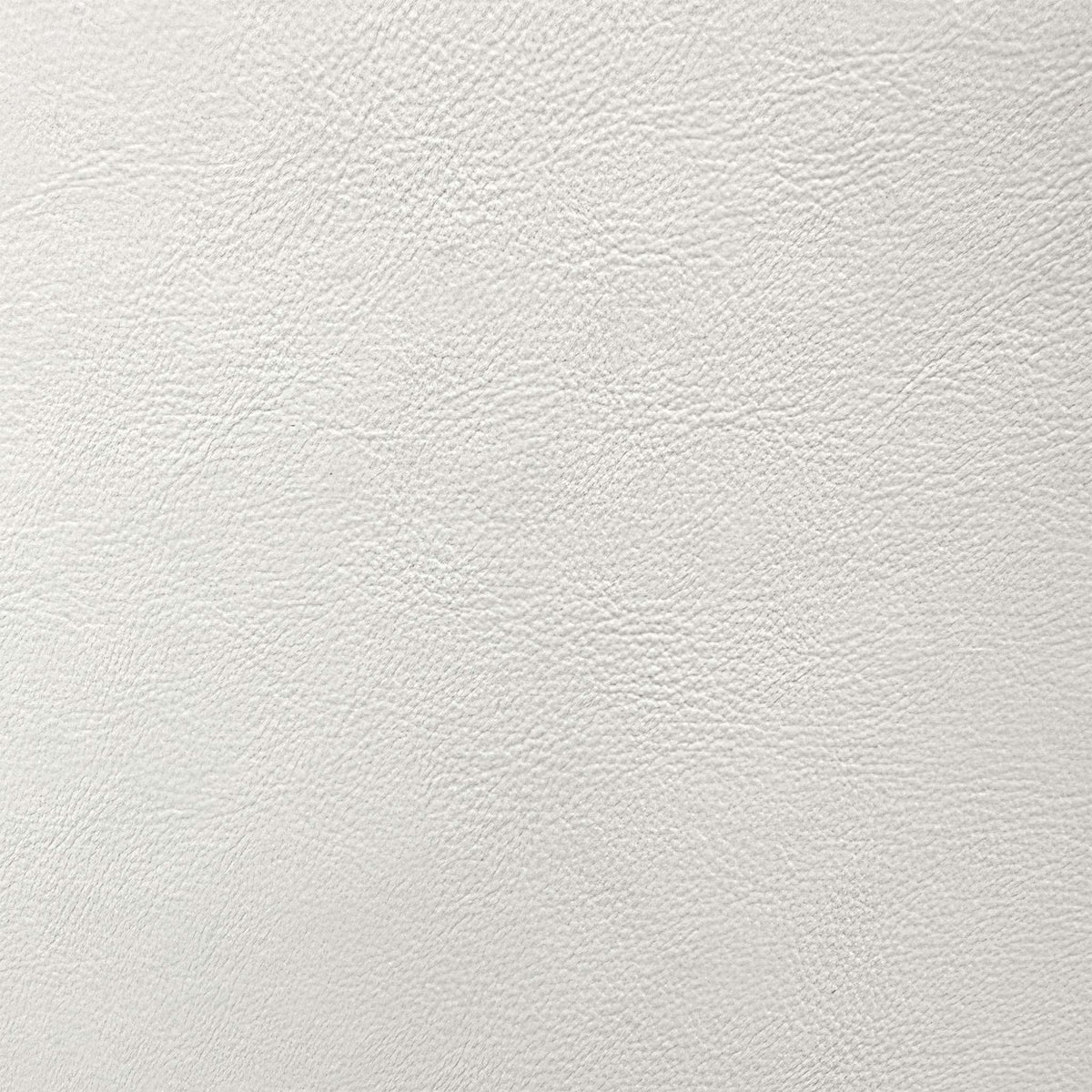 Close-up of the neutral grained faux leather used on the Avorio dining chairs