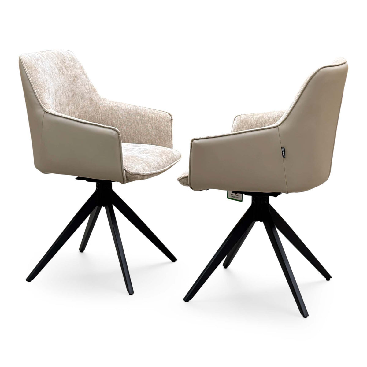 Front and back view of the Jose arm chairs from the set with fabric seats and black splayed legs