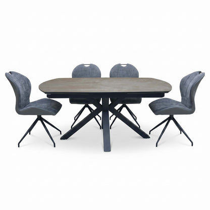 Front view of the Raul titanium grey ceramic dining table closed at 160cm with the 4 grey swivel chairs