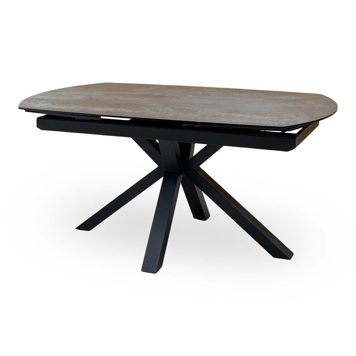 Raul titanium grey ceramic dining table at 160cm, raised angle showing the rounded top edge