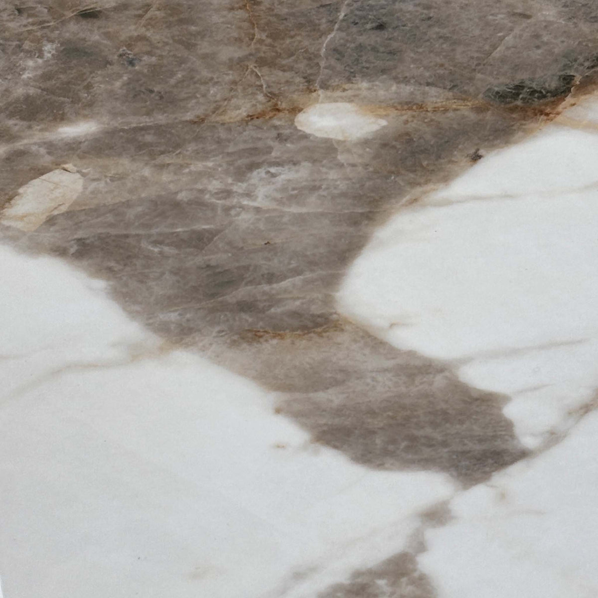 Close-up of the brown and white marble effect ceramic used on the Mekong sideboard top