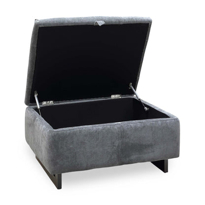 Moet storage footstool with the lid open showing the storage compartment and lid stays