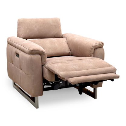 Moet sand beige velvet power recliner chair with the footrest raised, angled from the left