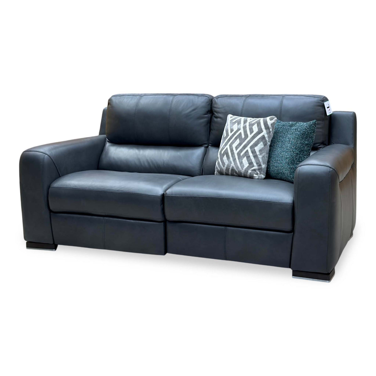 Marinelli Viali grey leather 3 seater power recliner sofa upright, angled view from the right showing the wide arm