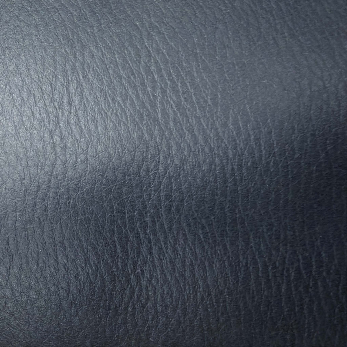 Close-up of the grey grained leather used on the Marinelli Viali power recliner sofa