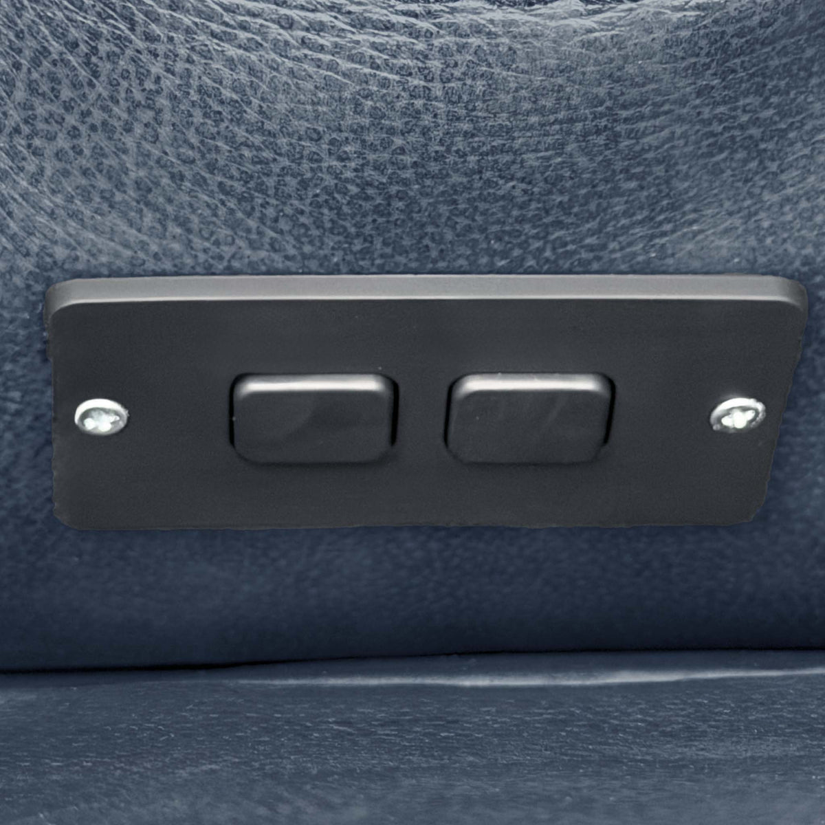 Close-up of the two-button power recline control panel on the side of the Marinelli Viali sofa