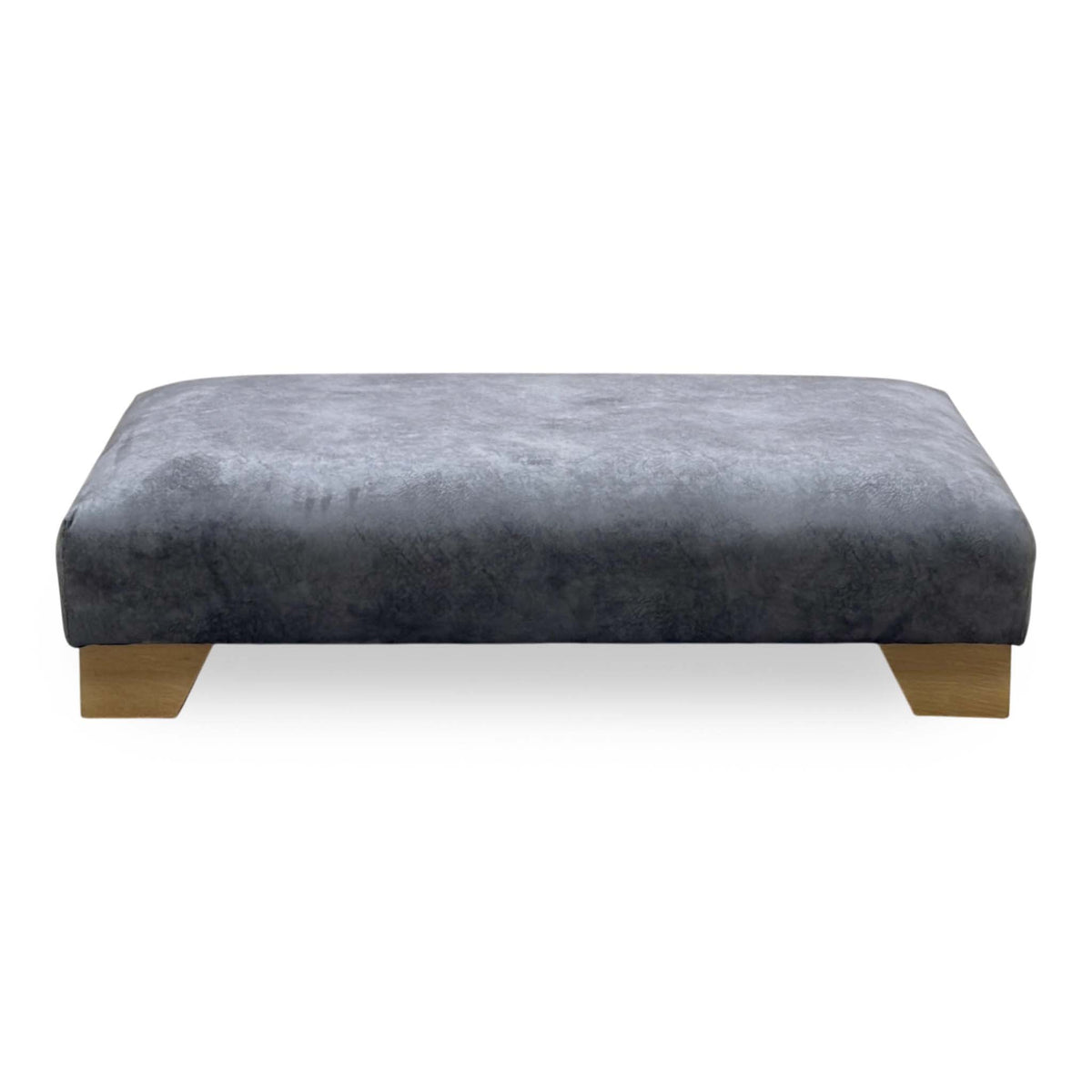 Front view of the Aura mink velvet designer footstool on oak block feet