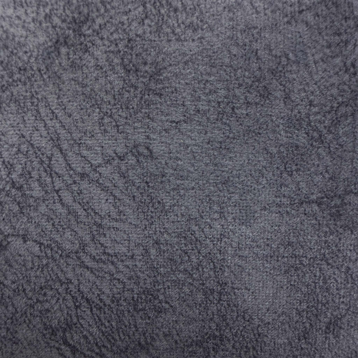 Close-up of the mink distressed velvet fabric used on the Aura footstool