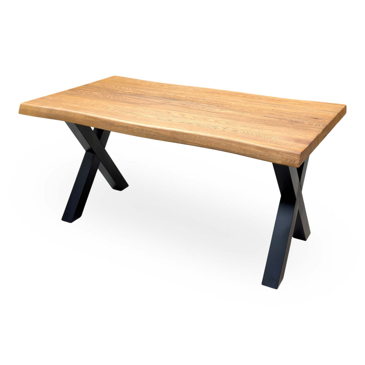 Bodahl Terra solid oak raw edge dining table cut-out angled from the right on black X legs