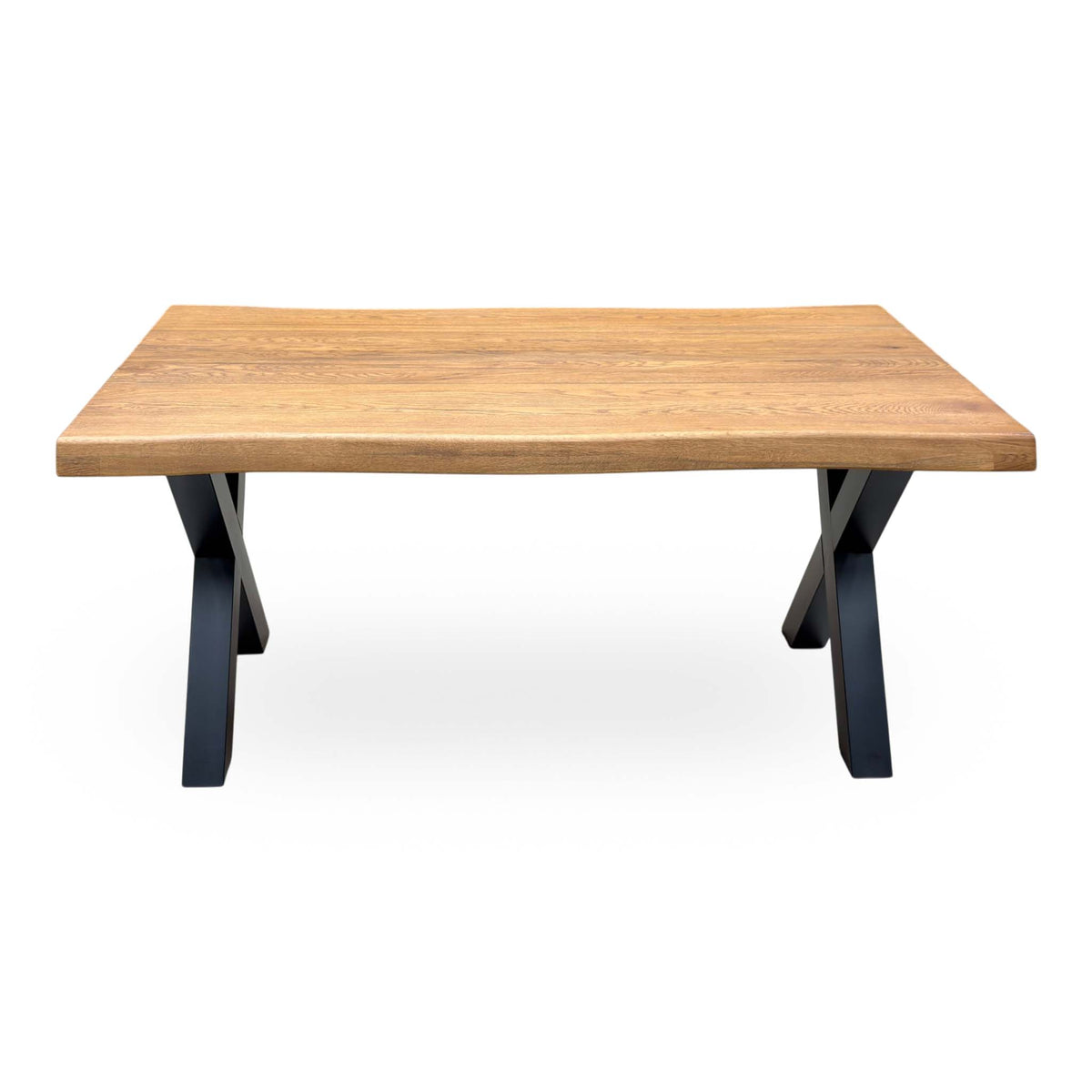 Front view of the Bodahl Terra solid oak compact raw edge dining table with black X-shaped legs