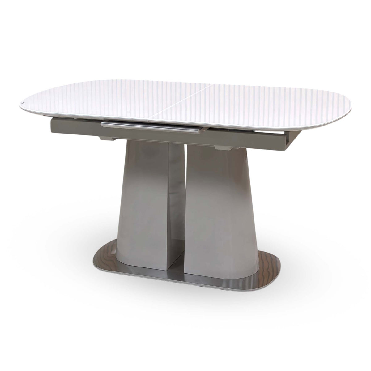 Cashmere white tempered glass top small extending dining table closed, angled from the left