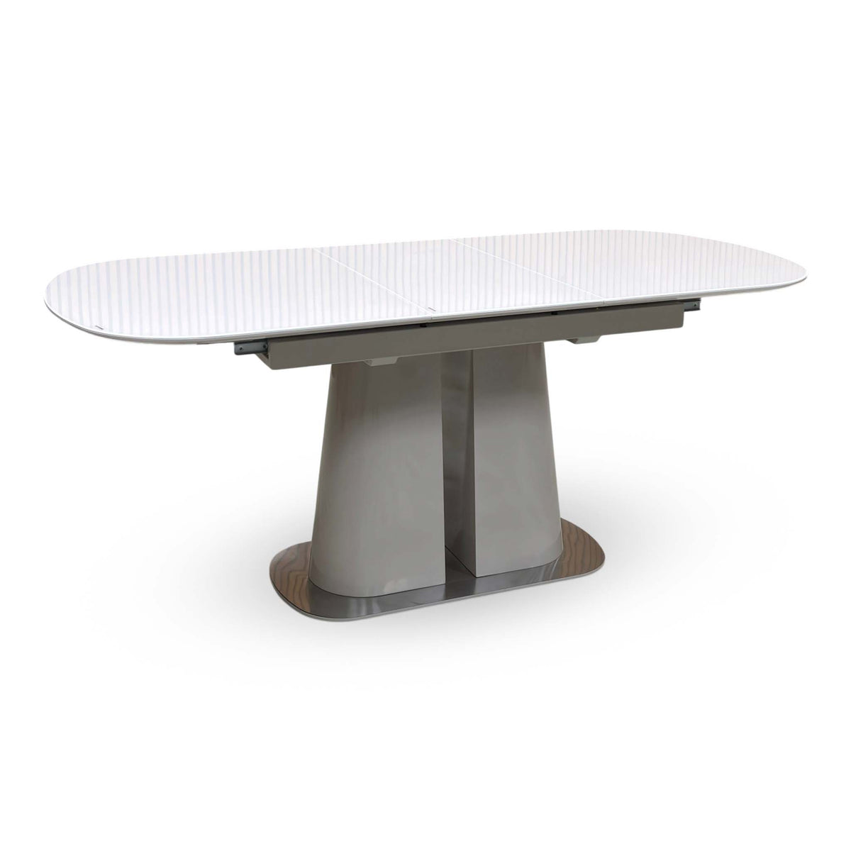 Cashmere white tempered glass top small extending dining table fully extended, angled view on a grey pedestal