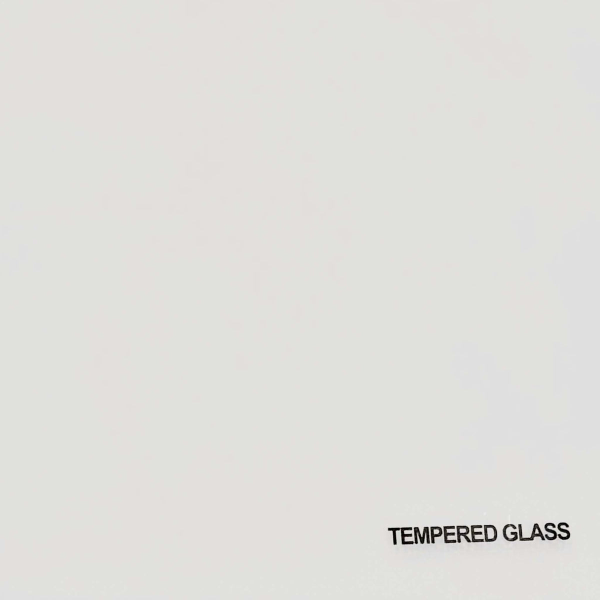 Close-up of the white tempered glass top used on the Cashmere small extending dining table