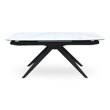Front view of the Carrera ceramic top extending dining table closed, showing the centre join and black legs